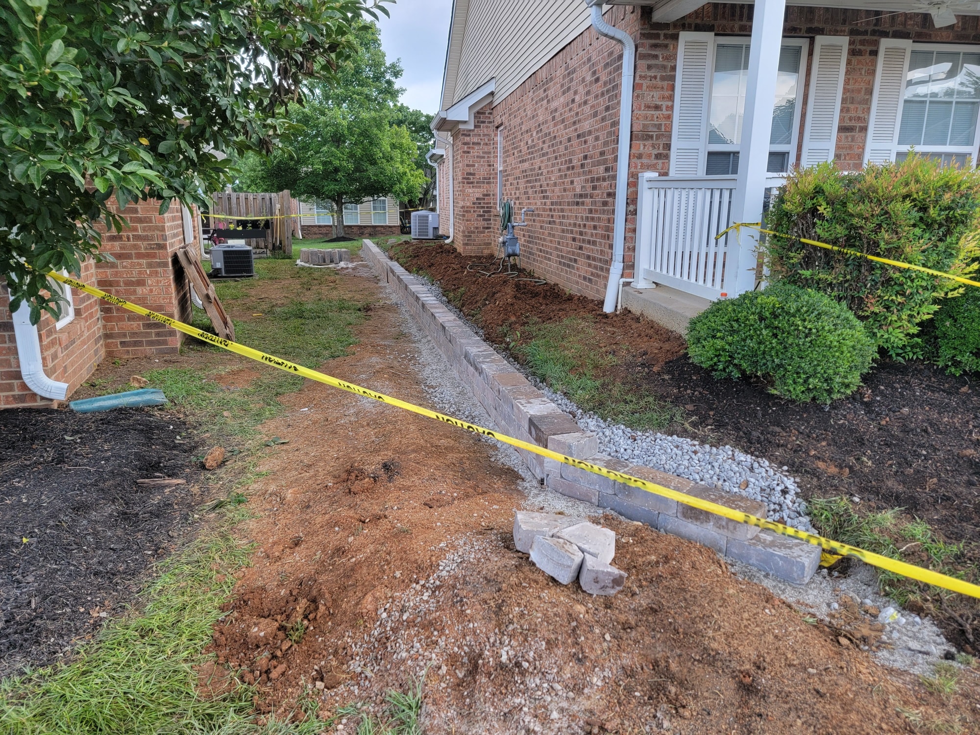 retaining wall around flower bed